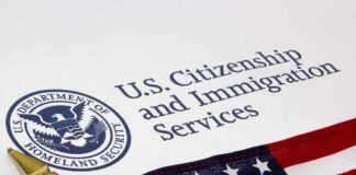 U.S. Citizenship and Immigration Services document with American flag