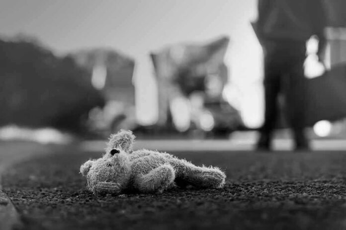 shutterstock_1173129871-1 Stuffed toy lying on pavement in black and white