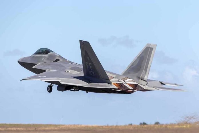 Stealth fighter jet taking off from runway