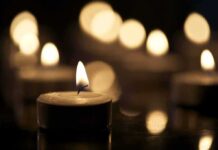 Jackson Hanging Mystery Fuels Outrage Tealight candle with soft glowing flame