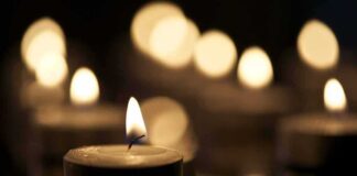 Tealight candle with soft glowing flame