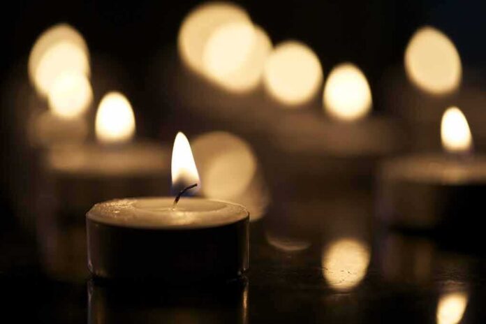 shutterstock_162957713 Tealight candle with soft glowing flame