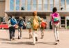 Religion Pushed Aside—Bishops Blast Warsaw’s Power Grab Group of schoolchildren with backpacks running toward a school entrance