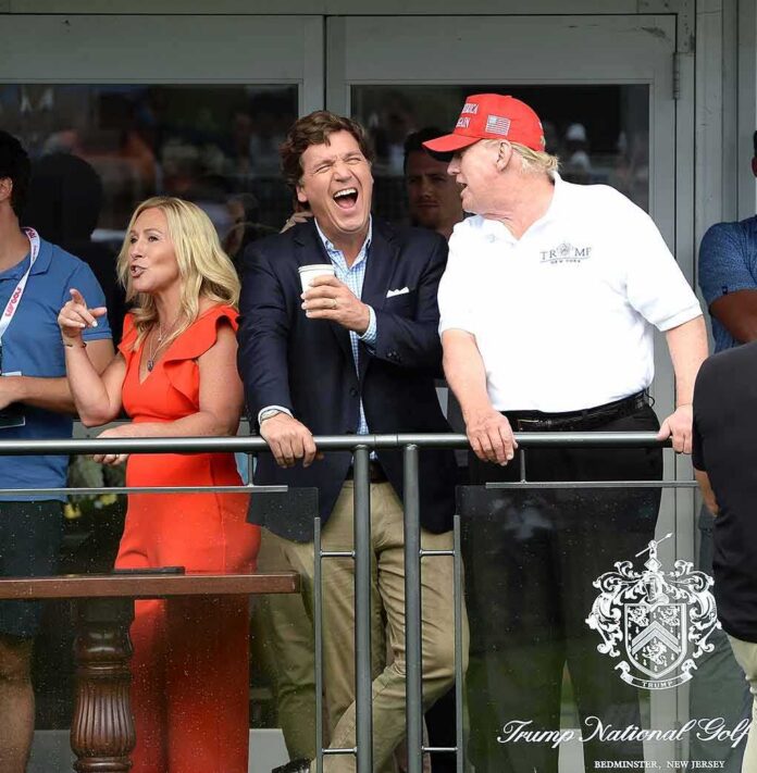 shutterstock_2185700485 group of people on a balcony at a golf event