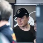 Apocalypse Talk—Now Musk Goes All-In man in black cap looks ahead indoors