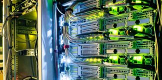 Server rack with network cables and glowing indicator lights