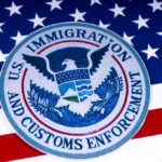 ICE emblem on an American flag