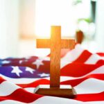 Atheist Showdown: Pentagon Won’t Blink Wooden cross on an American flag