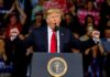 Trump Floods Safe States – Red-State Blitz Masks Bigger Play? Donald Trump speaking at a rally podium with arms raised