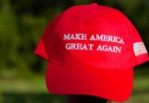 Red Texas Panic? Massive MAGA Spend Red baseball cap with political slogan and small U.S. flag patch