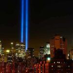 Families To Politicians: Don’t Exploit 9/11 New York City skyline at night with twin blue light beams