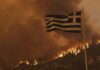 Power Threat Claim Explodes in Greece – Denial Fuels Bigger Mystery Greek flag over hillside wildfire