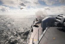Red Sea Grip Tightens – Trade Route on Edge naval warship firing deck gun at sea