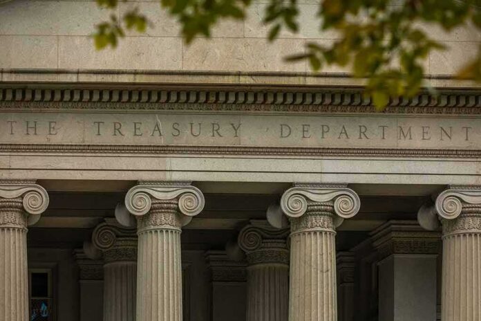 Neoclassical building facade with Ionic columns and engraved frieze