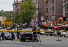 Ohio Festival Shooting Leaves at Least 12 Injured Police investigate a taped-off urban street crime scene