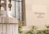 Department of Justice building facade with stone sign and window
