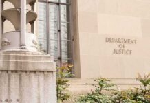 Prosecutor Quits – Brennan Dragged In Department of Justice building facade with stone sign and window
