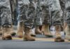 soldiers' boots marching on a road