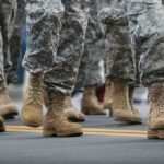 Staggering Base Damage – Photos Finally Surface soldiers' boots marching on a road