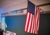 Vodka Run Exposed – Bathroom Meltdown Shocks Elementary American flag hanging in a classroom