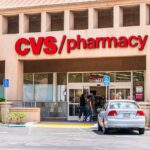 Taxpayer Rip-Off? CVS Opioid Fallout Exterior view of a CVS pharmacy with customers entering