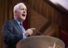 Donor Room Gasps: GOP Heavyweight Freezes Out Paxton John Cornyn speaking at a podium