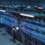 Scary Preview: Microsoft Seals Off Data Technician with laptop in a large data center aisle