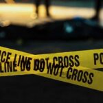 Cartel Drone Bombs: Workshop Uncovered Near U.S. yellow police tape at a nighttime crime scene