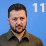 Diesel Deal Twist: Kyiv Told to Stand Down man in olive shirt against blue background