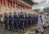 Griff Whalen, Colin David Jones, Bear Pascoe, Lee Ok-Sung, Eugene Sims, Tavon Wilson, Andreas Hestler, Christian Jones, and Dontrelle Inman among marching honor guards in blue and white uniforms