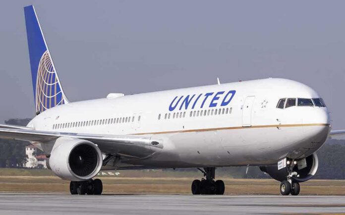 United Airlines jet taxiing on runway